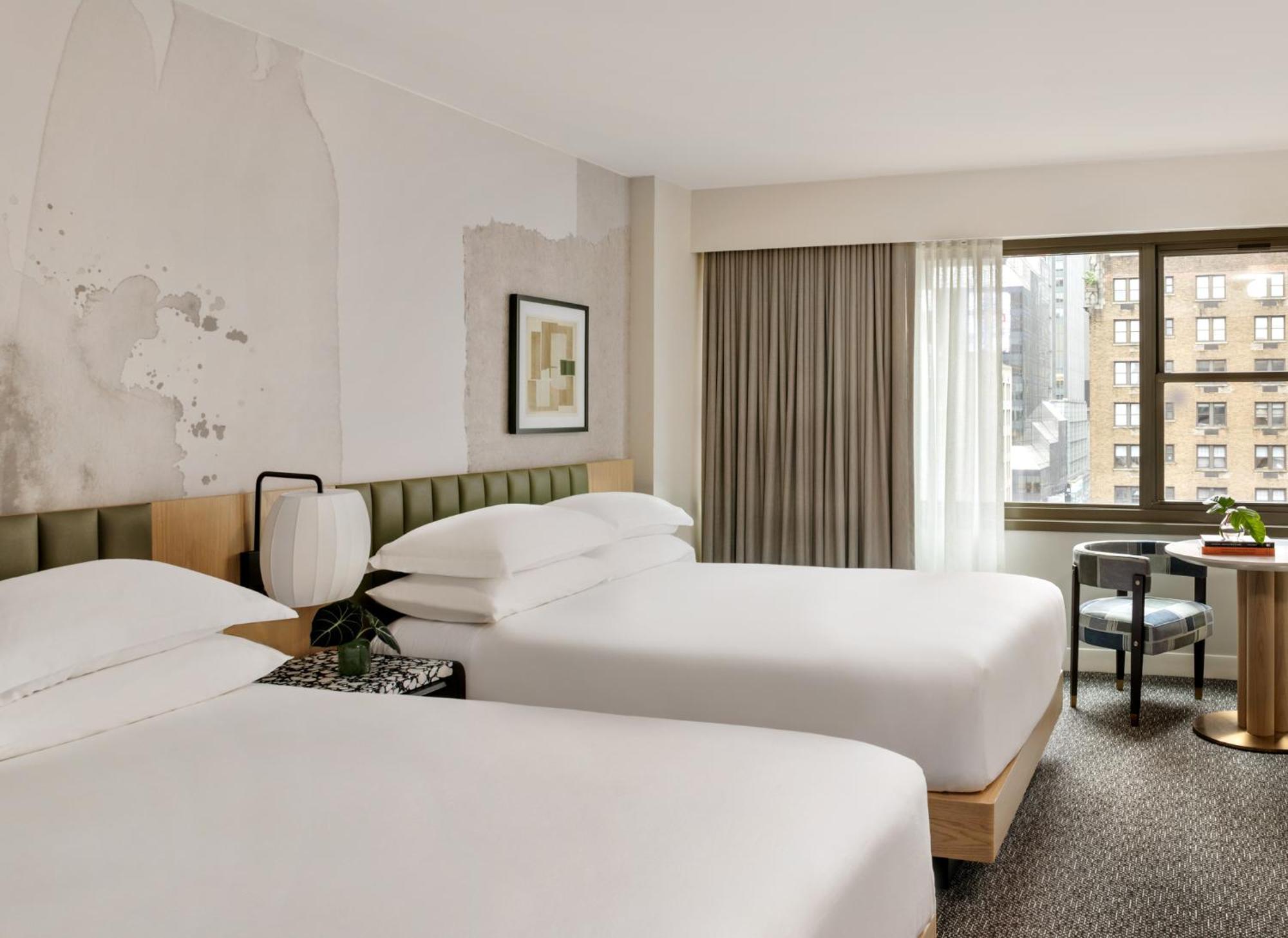 Kimpton Theta New York - Times Square By Ihg Hotel Exterior foto A guest room at the hotel