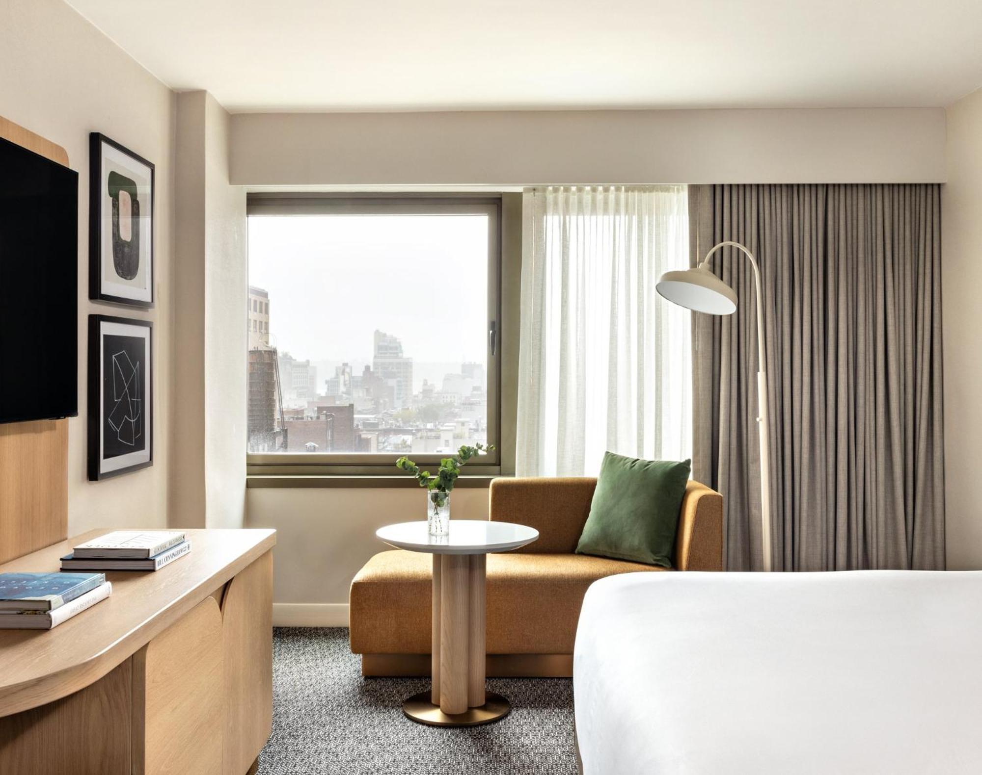 Kimpton Theta New York - Times Square By Ihg Hotel Exterior foto A guest room at the Hotel Commonwealth